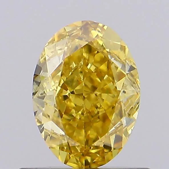 0.69ct Oval Lab Grown Diamond (Colour Fancy Vivid Brownish Yellow, Clarity VS2, IGI Certified)